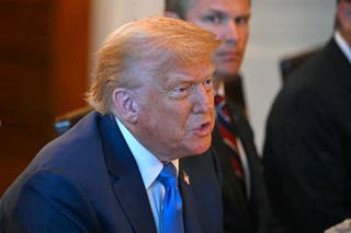 President Donald Trump delivers remarks as he hosts Israeli prime minister Benjamin Netanyahu for a dinner in the Blue Room of the White House